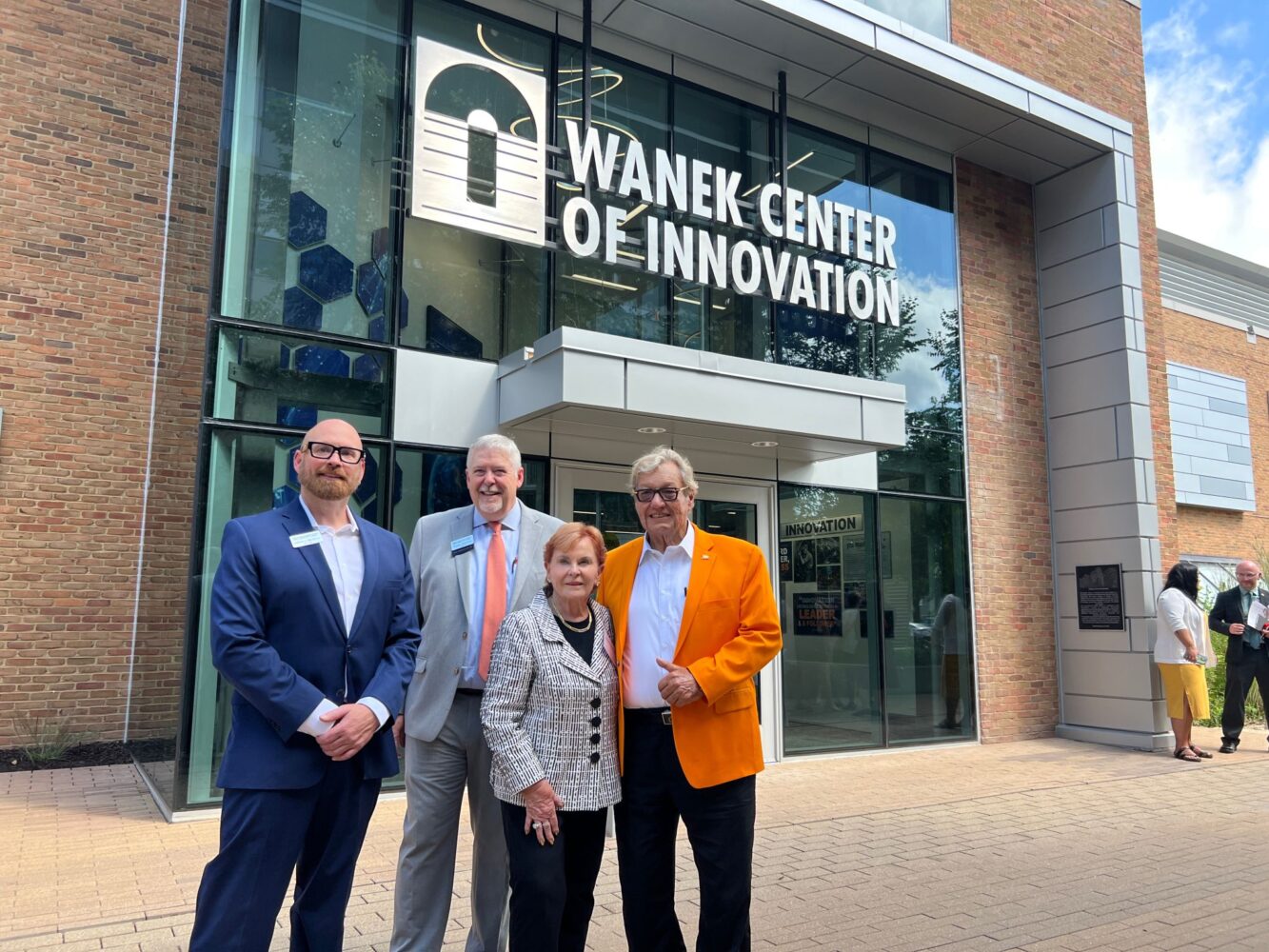 Dr. Josh Gamer, Dr. Roger Stanford, Joyce Wanek, Ron Wanek in front of the new Wanek Center of Innovation at Western Technical College